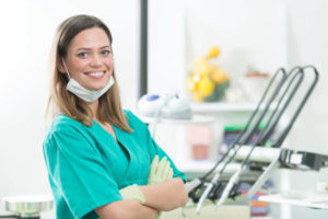 Female dental hygienist smiling